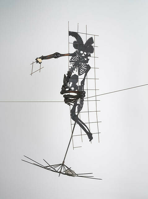 Still Keeping His Balance, He Used The Umbrella As A Safety Net - image of a man with missile by Bing Dawe