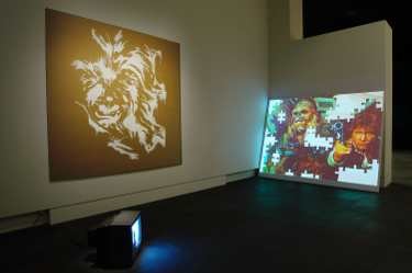Nathan Pohio's installation at Te Puawai o Ngai Tahi 2003, Christchurch Art Gallery Te Puna o Waiwhetū.(from left to right) Untitled (Screen 1) 2003 Data projector, DVD player & screen, dimensions variable;Untitled (Wookie Shuffle) 2003 VHS deck & monitor, dimensions variable; and Untitled 2003 Pastel on card