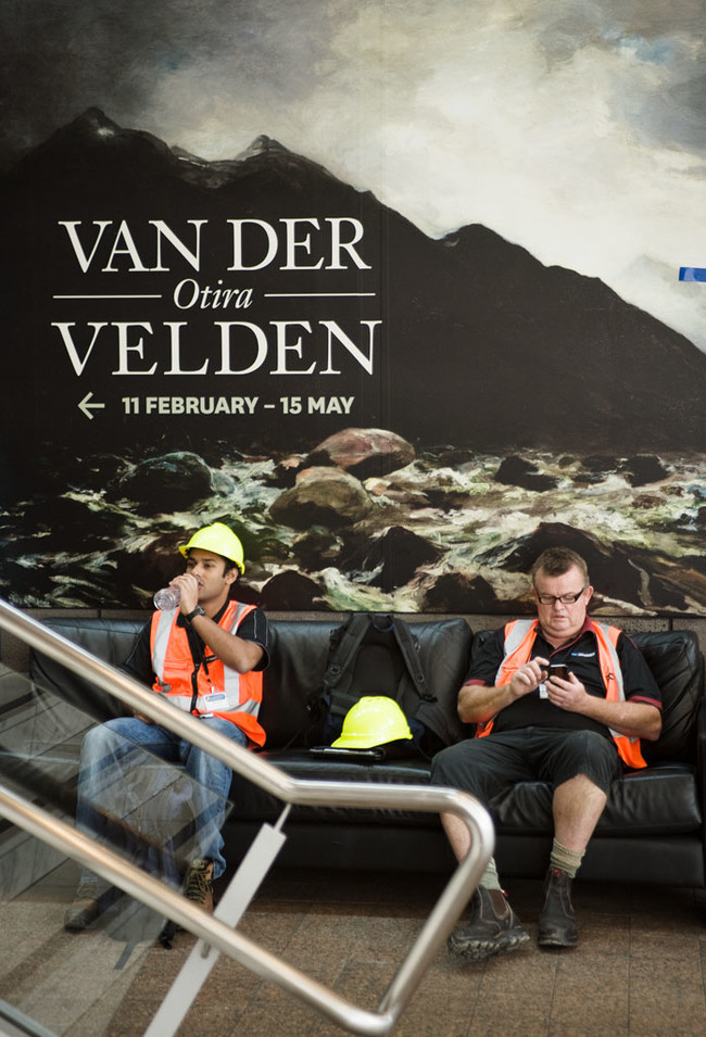 Emergency response staff recharge in the Gallery foyer. By this point the exhibitions had been dismantled and packed away, but the signage remained: Photo: John Collie