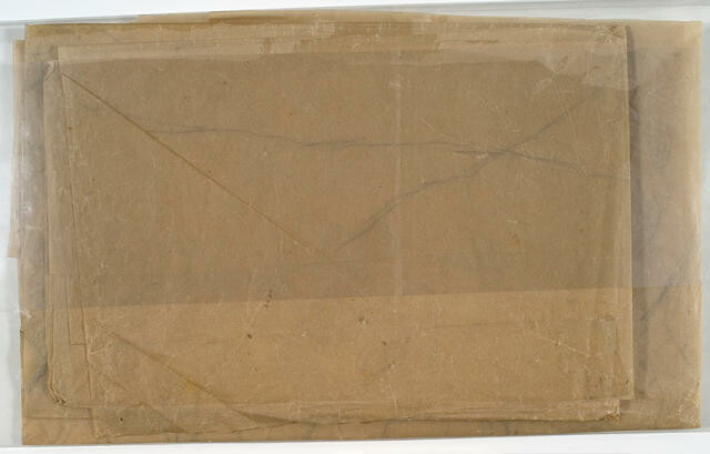 This image shows item 99/319 and item 99/320 folded and wrapped in plastic