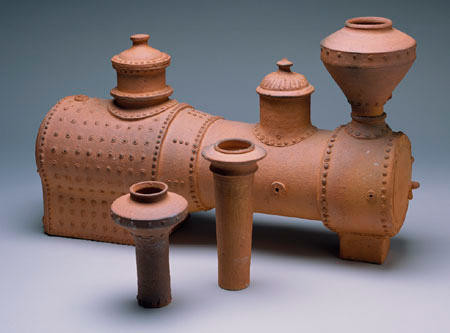 Barry Brickell Loco boiler (with alternative stacks for warming the hands) 1976. Terracotta. Collection of Christchurch Art Gallery Te Puna o Waiwhetū, purchased 1976