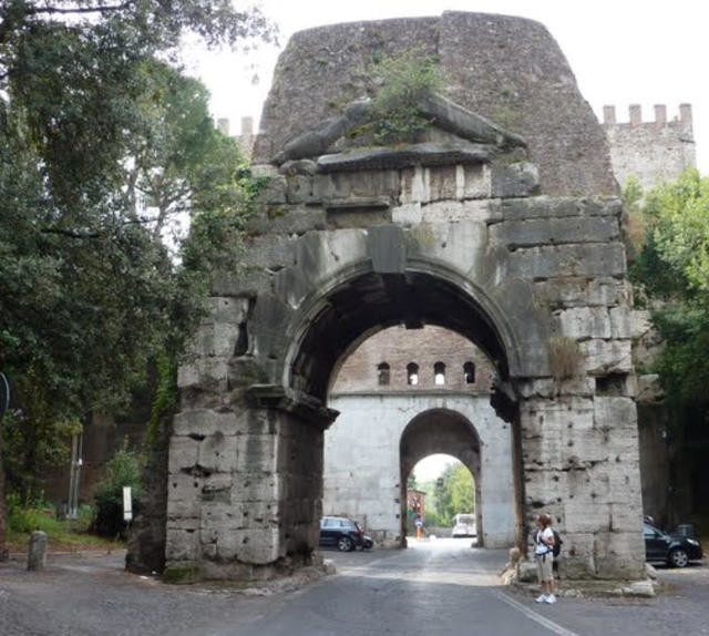 The Arch of Drusus and behind it the Porta Capena as they now appear.