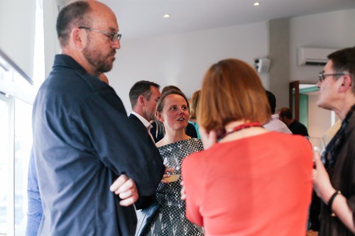 Paula Orrell of CoCA speaks with Neil Semple and Jenny Harper of Christchurch Art Gallery and artist Julia Morison at the Brown Bread B Corp celebrations