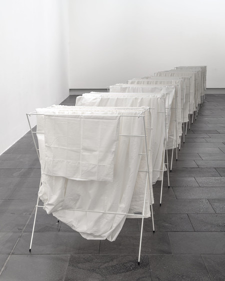 Grant Lingard Swan Song 1995–96. White enamel-coated laundry drying racks, sheets, pillowcase and towels. Collection of Christchurch Art Gallery Te Puna o Waiwhetū, gift of Trevor Fry, 2013