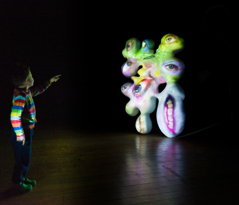 A young visitor with Tony Oursler's Spectar