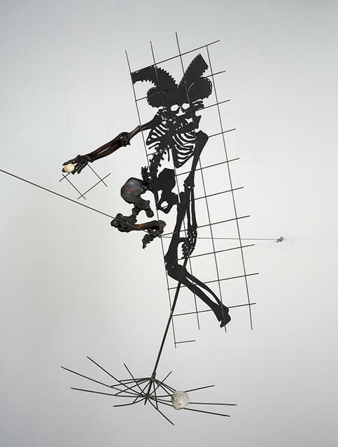 Still Keeping His Balance, He Used The Umbrella As A Safety Net - image of a man with missile