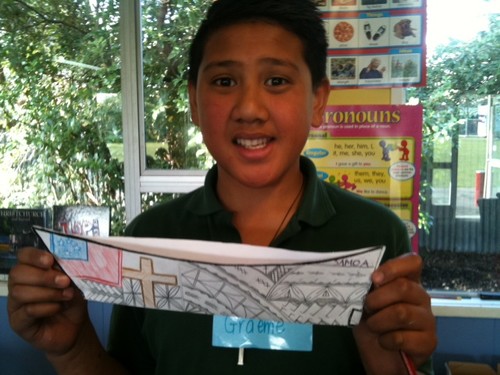 Graeme from St Anne's Catholic Primary School working on his waka decorated with Samoan patterns.
