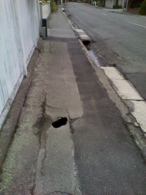Footpath hole, Courtenay Street, Christchurch. December 2011