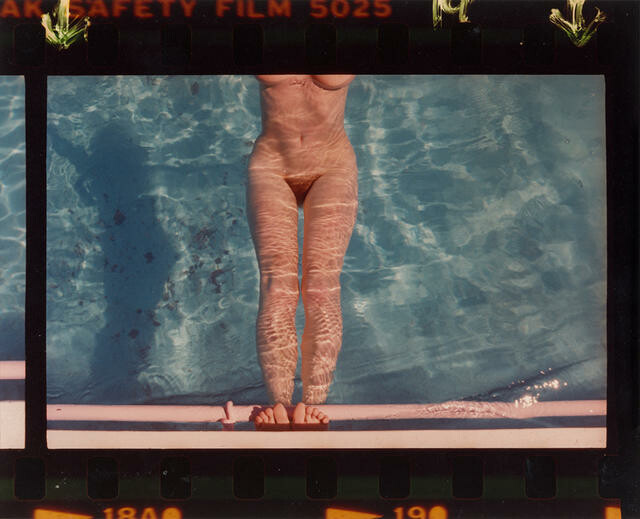 Pink nude in a blue pool