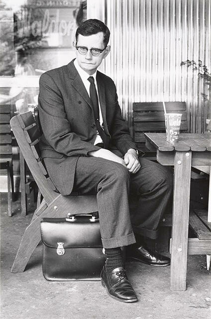 Man at an outdoor cafe