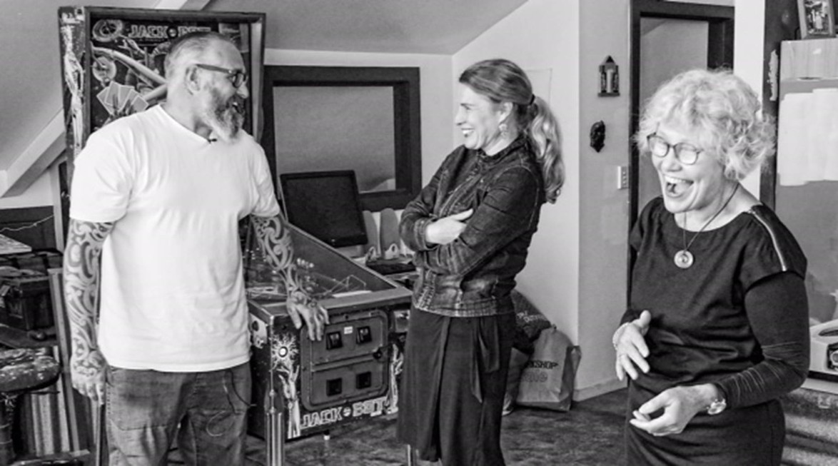 Curator Felicity Milburn and director Liz Grant interview artist Wayne Youle in his studio.