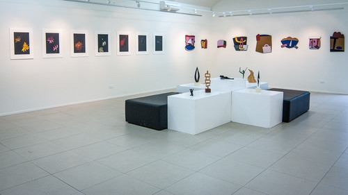 Installation shot including works by Eion Stevens (back wall)  and Denise Copland (left wall)