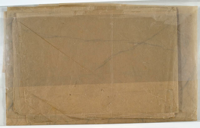 This image shows item 99/319 and item 99/320 folded and wrapped in plastic