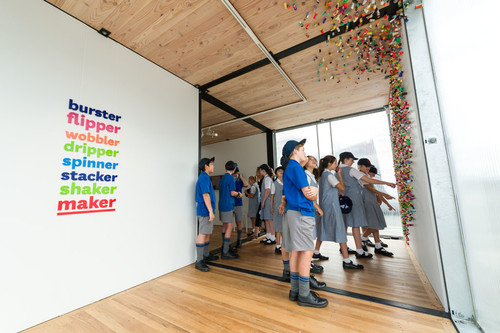 A school group (not Tierney's) look through the exhibition.